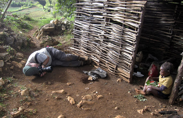 Paul laying down on the job in Haiti.